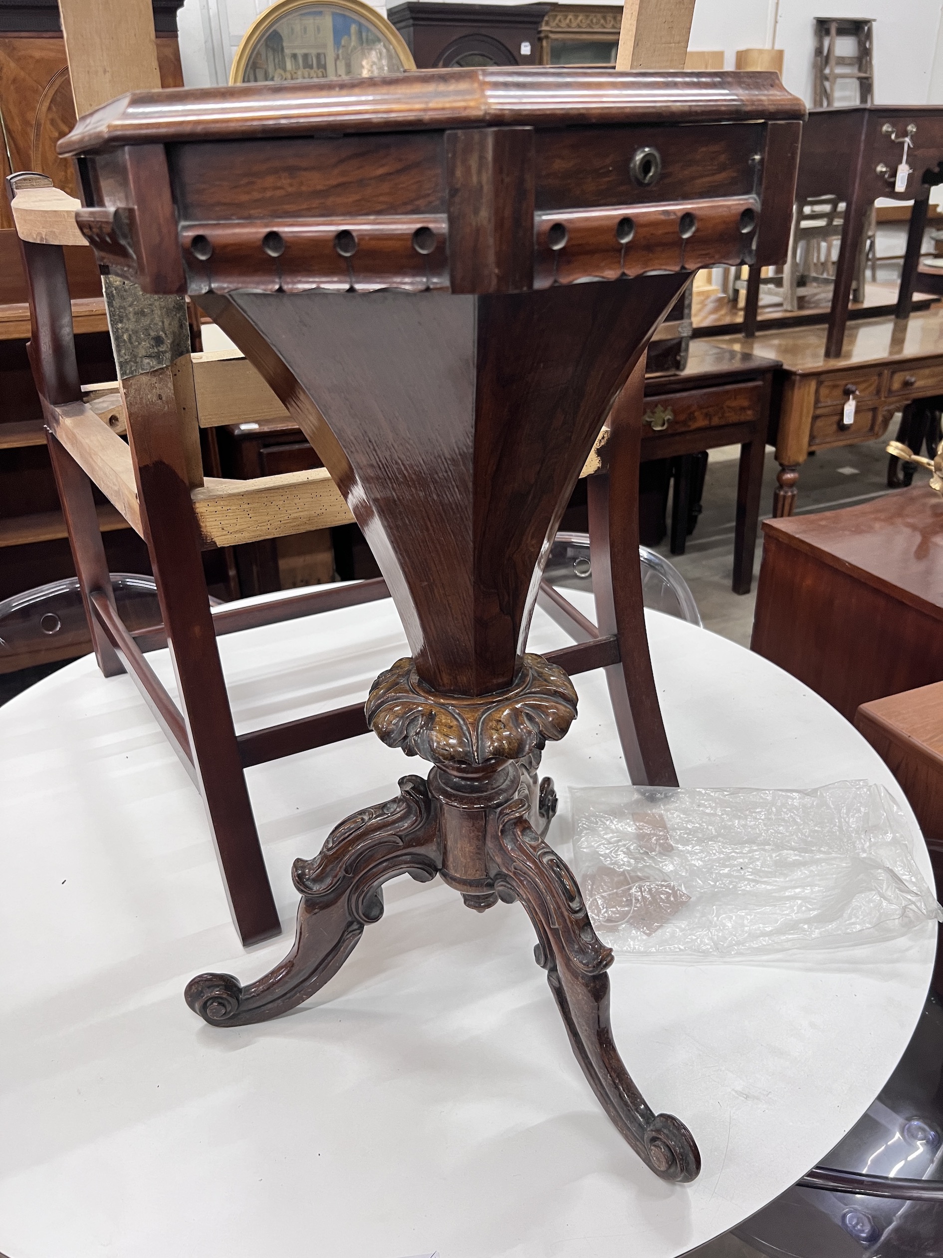 A Victorian octagonal rosewood trumpet work table, width 44cm, height 74cm